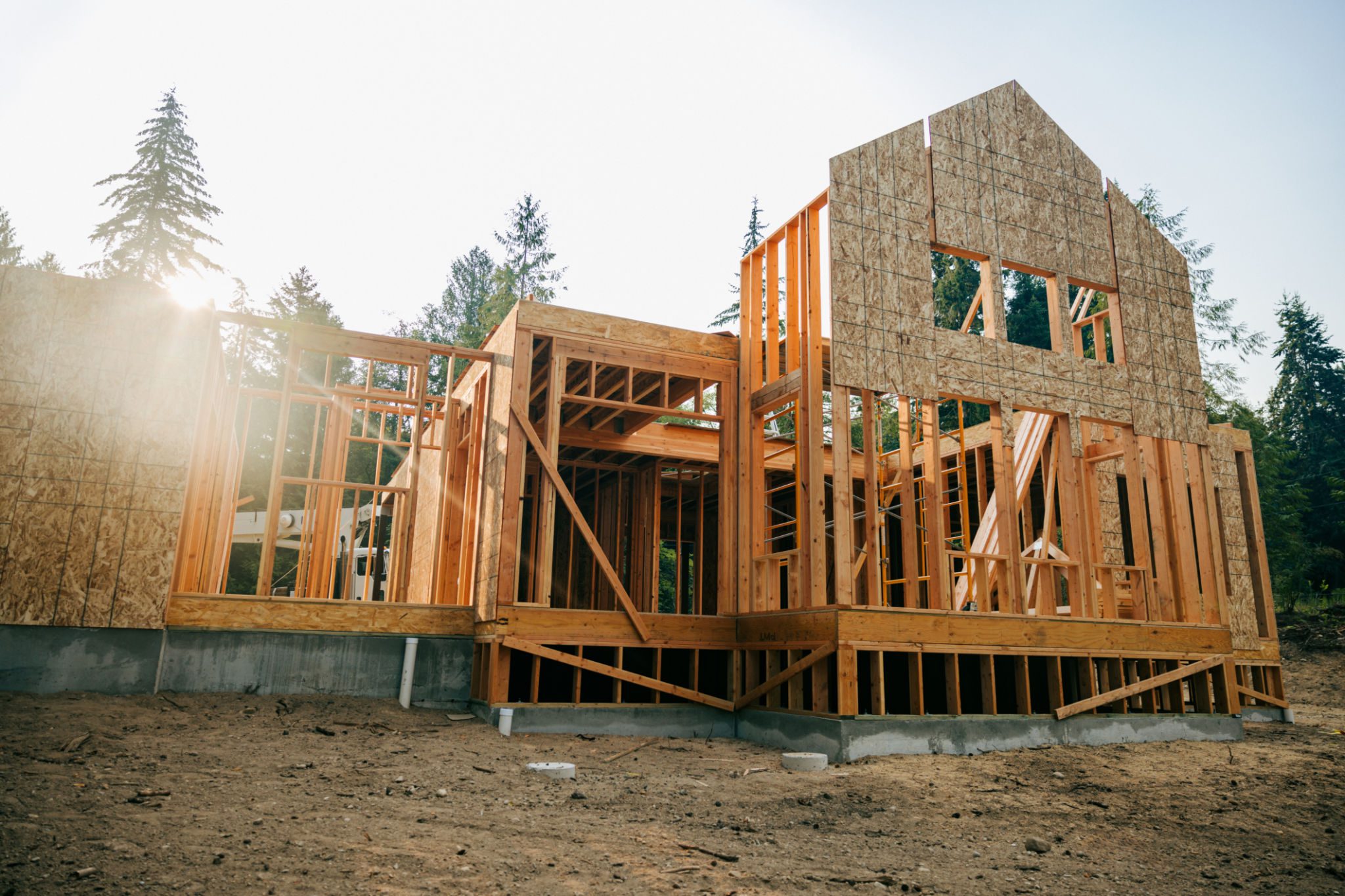 House under construction with wooden framework